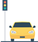 The car drove along the road and stopped at the signal.